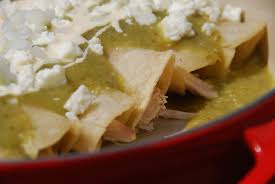 enchiladas verdes in a tomatillo sauce