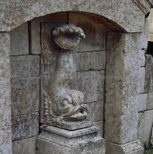 large garden fountain in aged stone