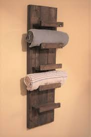 Add function without compromising style with the addition of towel bars and shelves to your bathroom. 41 Inspirations Bath Towel Storage Racks Ideas Daily Home List Pallet Bathroom Diy Towel Rack Bathroom Shelves For Towels