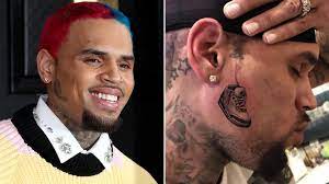 The singer was pictured leaving a restaurant in santa monica the move comes on the same day brown endured a huge online backlash after people pointed out that a new tattoo on his neck bore a striking. Chris Brown Reveals Huge New Face Tattoo For His Love Of Trainers Metro News