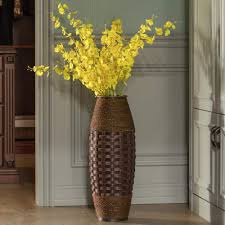 antique cylinder style floor vase