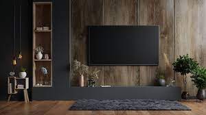 Tv Wall Mounted In A Dark Room