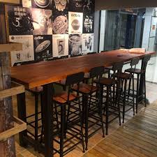 We have counter height chairs and stools at the right height for a tall table and lower ones to use at kitchen worktops and islands. Starbucks Bar Table And Chair Combination American Style Coffee Shop High Table Solid Wood Bar Iron Bar Long Tabl Bar Table And Stools Bar Table Pub Table Sets