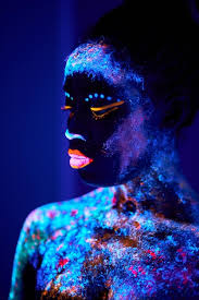 black female with uv body art glowing