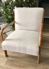 esters wood arm chair in costa