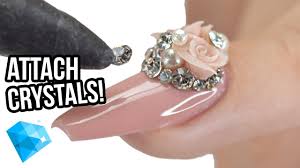 attach crystals onto your nails