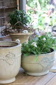 Use French Pedestal Urns To Add French