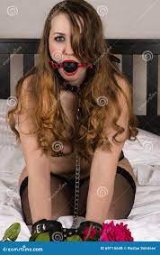 Attractive Woman Gagged on the Bed with Handcuffs Stock Photo - Image of  blond, fashion: 69715648