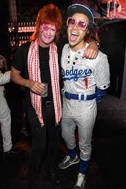 As john's manager for 28 years, reid amassed a fortune that he. Harry Styles Elton John Costume British Gq British Gq