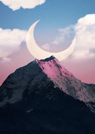 crescent moon over mountain