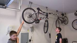 The garage bicycle storage lift system (model#: Top 10 Lifts For Bike Storage Of 2021 Video Review