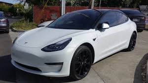 Doing the trim in satin black and side markers, door handles, and logos in frozen vanilla. Tesla Model 3 Chrome Delete Oreo Style With Cquartz Finest Reserve Youtube