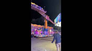 teetering carnival ride from tipping