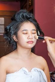 asian thai getting makeup