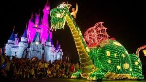 Image result for The Main Street Electrical Parade, with crowd favorite Peteâ€™s Dragon, is back Aug 2 â€“ Sept 30! Book your Disneyland trip today.