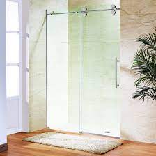 frameless sliding shower enclosure in