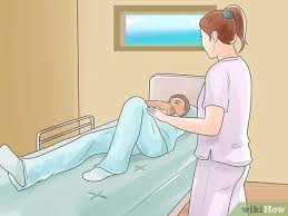 Lower the patient lift for easy attachment of the sling. 3 Ways To Use A Hoyer Lift Wikihow