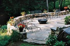 A Curved Stone Retaining Wall Adds