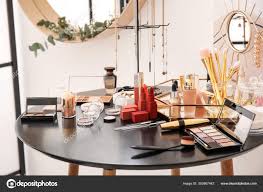 diffe cosmetics table makeup artist