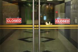 Glass Door With Closed Sign Stock