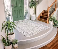 grand entrance with an entryway rug