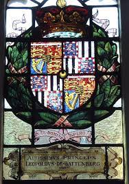 stained glass window with arms of
