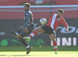 Joe willock of arsenal is challenged by danny ings of southampton during the premier league match between arsenal and southampton at emirates stadium on december 16, 2020 in london, england. A4dnnu3qcyzxfm