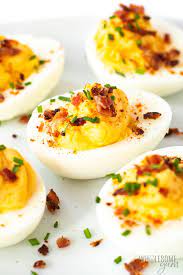 The eggs are often seasoned with spices like paprika or cayenne pepper. Easy Keto Deviled Eggs Recipe Wholesome Yum