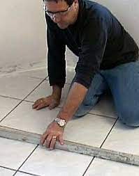 installing hardwood floors over tile