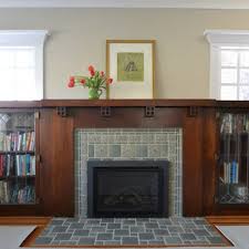 living room with a tile fireplace