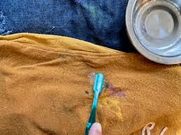how to remove paint from clothes