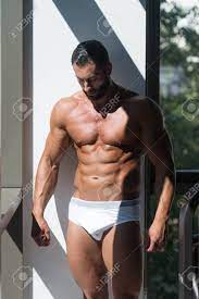 Portrait Of A Sexy Muscular Man In Underwear Looking Through Window Stock  Photo, Picture and Royalty Free Image. Image 67266802.