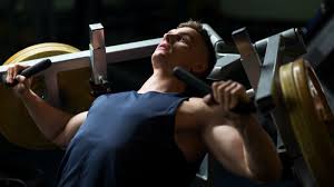 how to use the chest press machine for