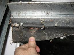 help iding bottom garage door seal