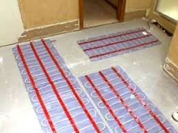 This system is used when no sand and cement screed is being installed and the tiles are being directly 'stuck' to the floor surface. How To Install A Radiant Heat System Underneath Flooring Heated Floors Floor Heating Systems Radiant Floor Heating