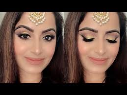 golden indian wedding guest makeup
