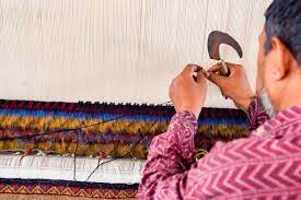 the knotting technique of handmade rugs