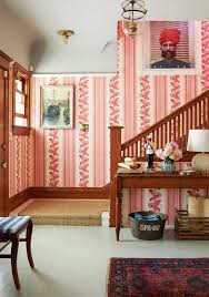 For each section of banister or railing, apply a generous amount of paint along the center of the handrail. 25 Stair Railing Ideas To Elevate Your Home S Style Better Homes Gardens