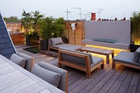 A Roof Terrace With Flat Roof Tiles