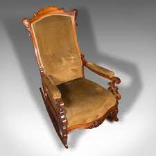 english rocking chair in walnut 1880s