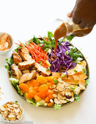 In a large salad bowl, toss the cabbage, cucumber, carrots, cilantro and onions. Light Chinese Chicken Salad Immaculate Bites