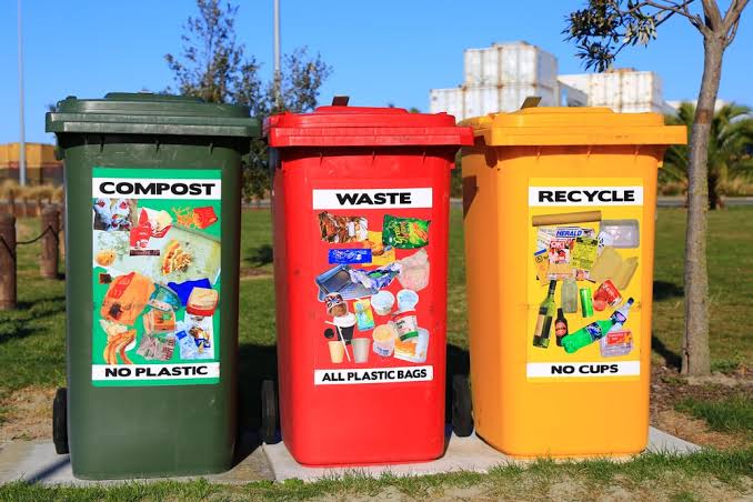 Compost, recycle and waste bins.