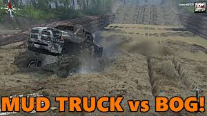 spin tires huge mud truck vs mud bog