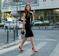 black dress with red shoes and slay
