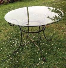 round glass garden table in