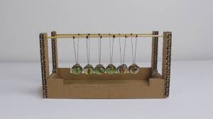 I'll show you how to make a newton's pendulum cradle, that you can use it like a kid's toy or put it on your desk. How To Make Newton S Cradle Assembly Kit From Marbles And Cardboard Youtube