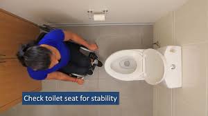 Describe what the people are doing. Bathroom Transfers Sci Empowerment Project Wheelchair Skills Video 19 Youtube