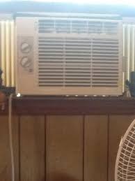 The fuse is blown/circuit breaker is tripped. General Electric 5 000 Btu Window Air Conditioner 115v Ge Aey05lv Walmart Com Walmart Com