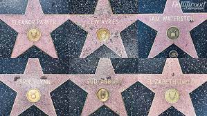 Each star has the name of the celebrity and an icon to represent what genre they are receiving the star for. Hollywood Walk Of Fame Why 20 Of The Stars Are In Disrepair Hollywood Reporter