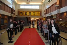 joliet west students roll out the red